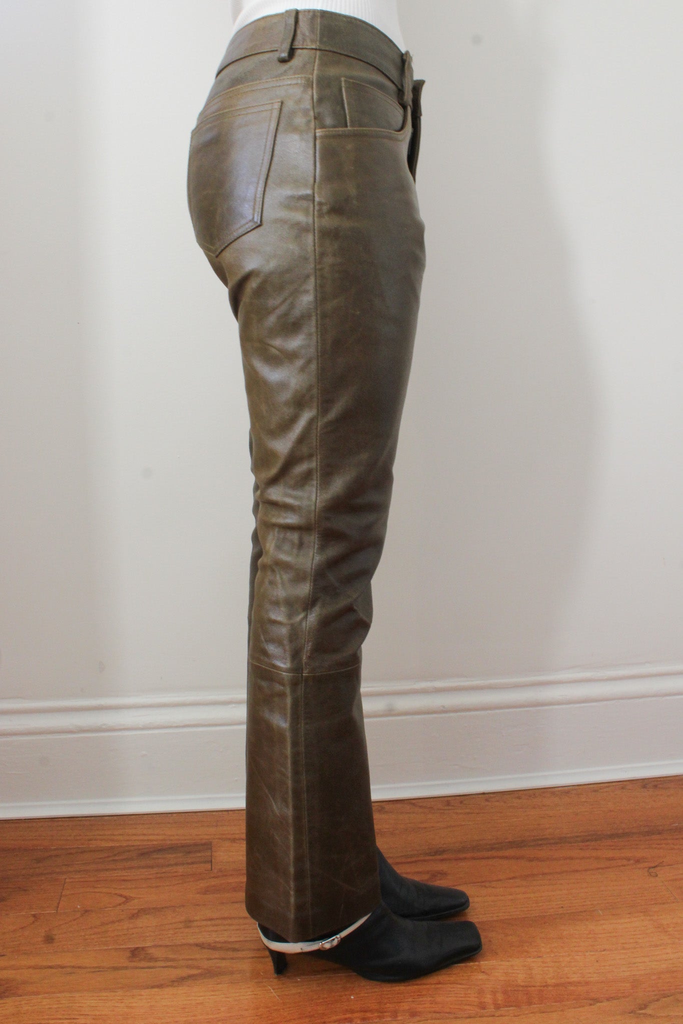Green leather pants