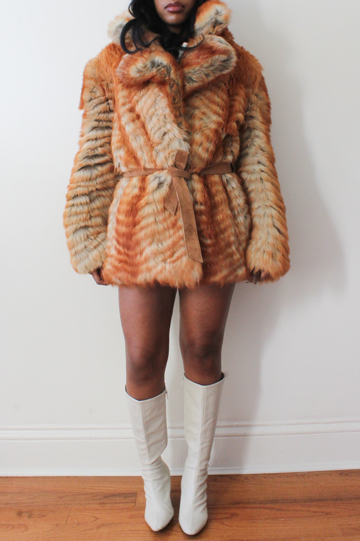 Belted fur coat