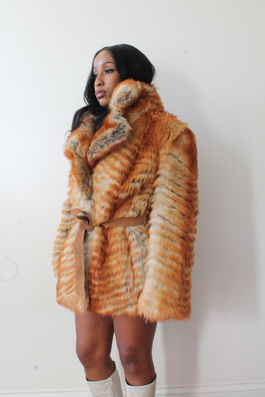 Belted fur coat