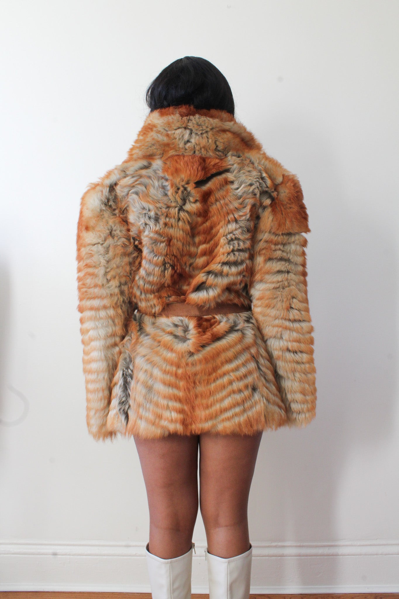 Belted fur coat