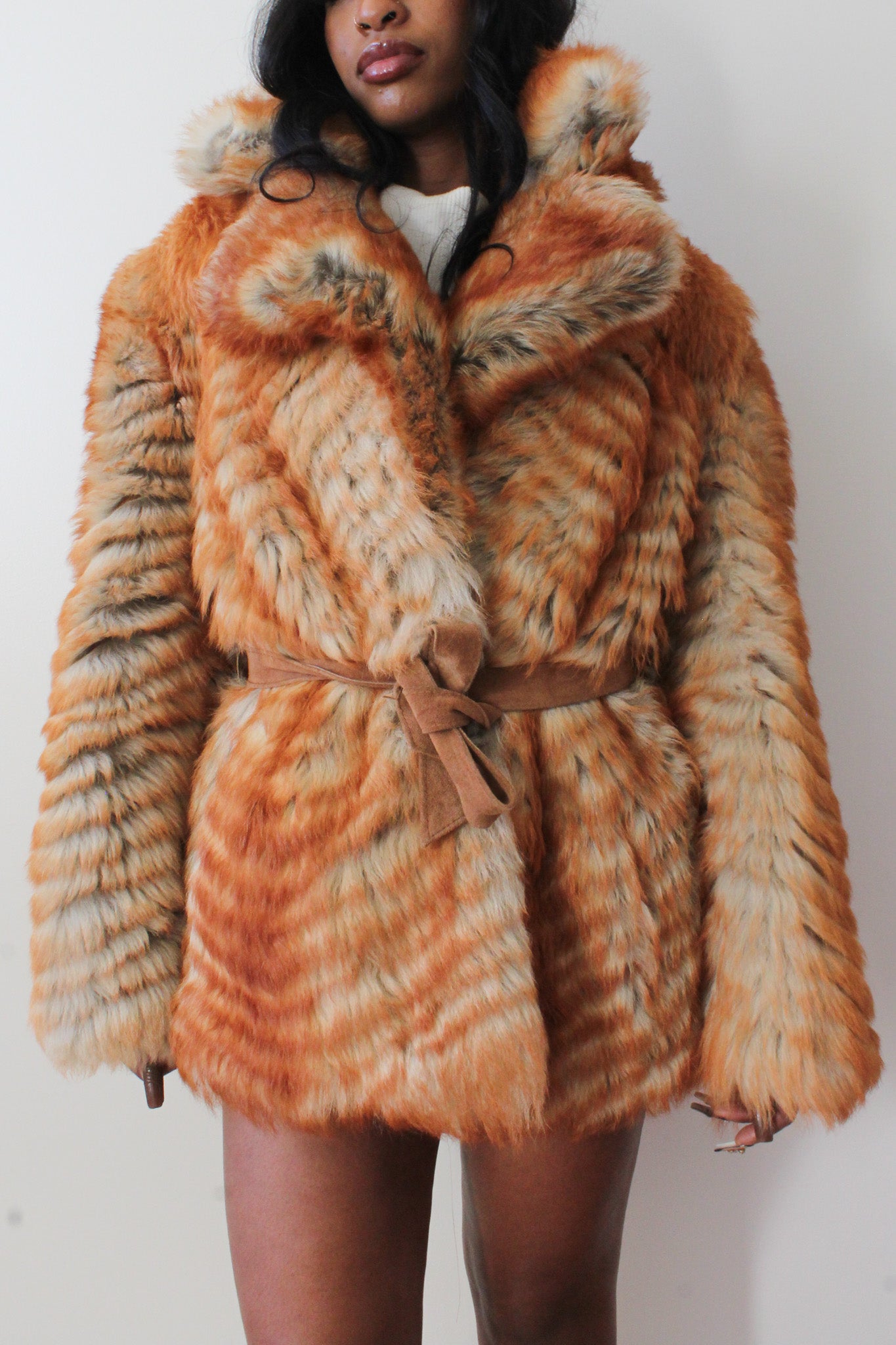 Belted fur coat