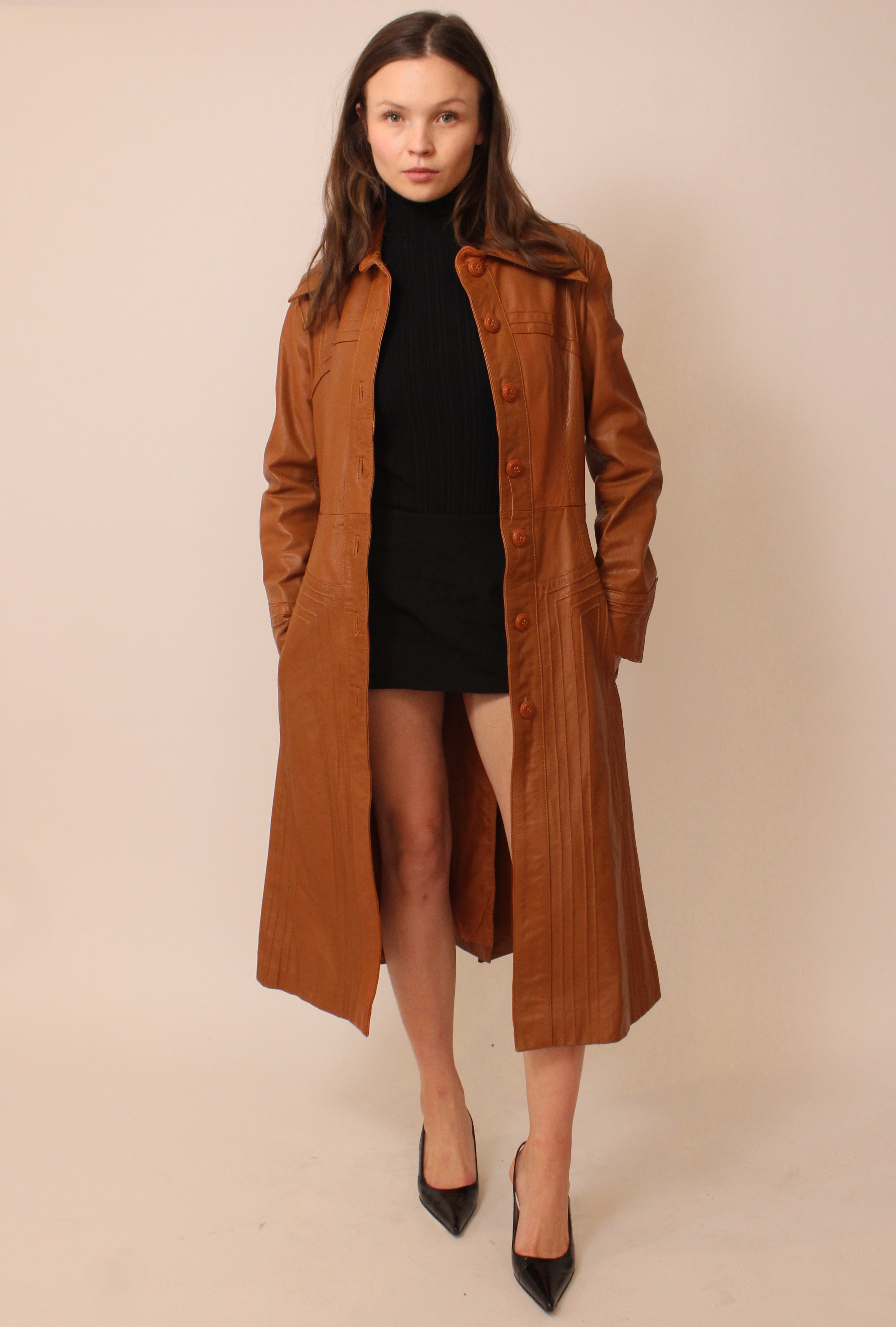Rust orange belted leather trench coat