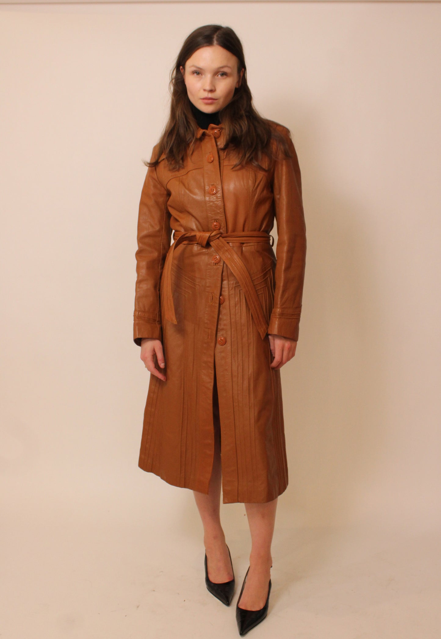 Rust orange belted leather trench coat