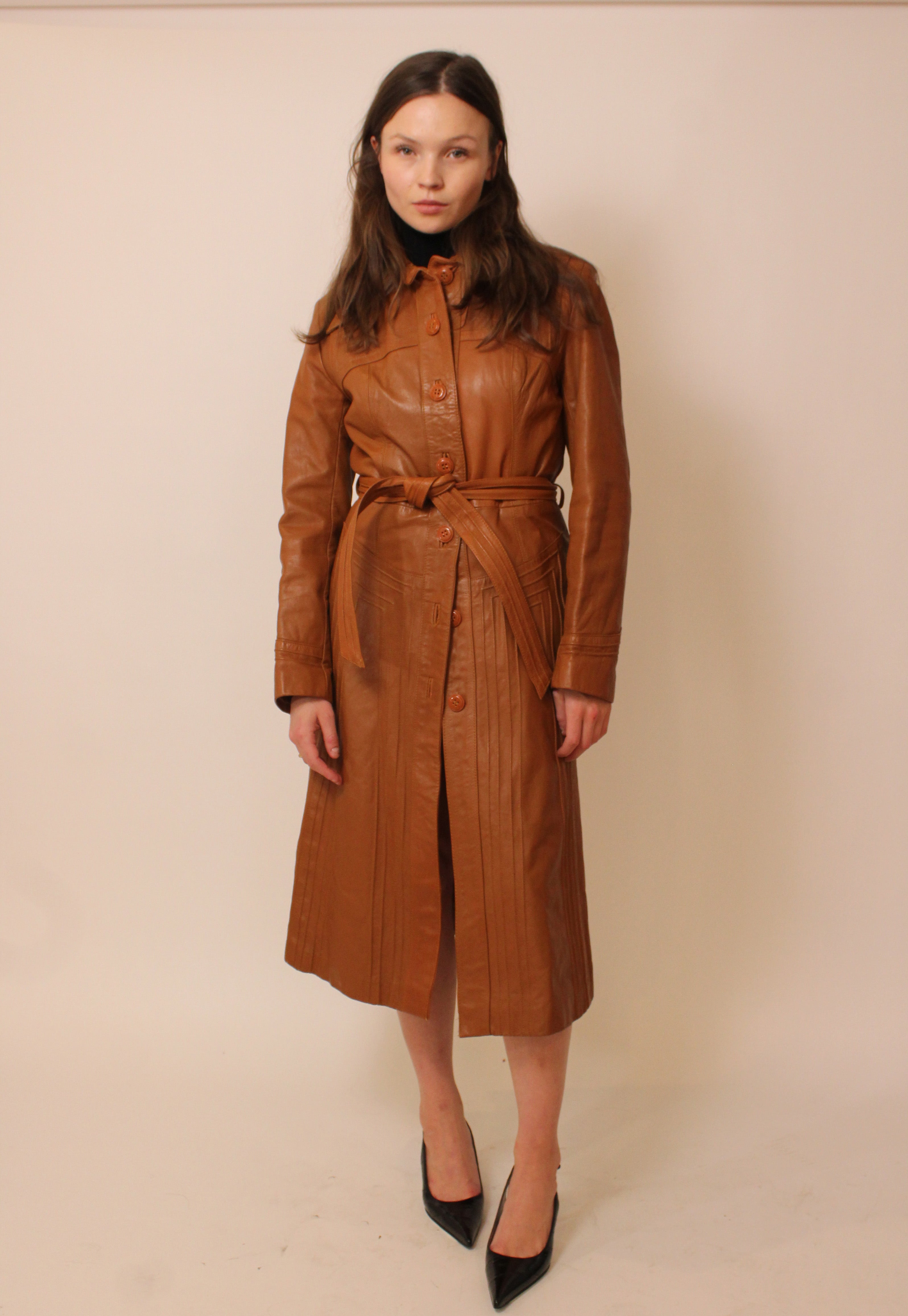 Rust orange belted leather trench coat