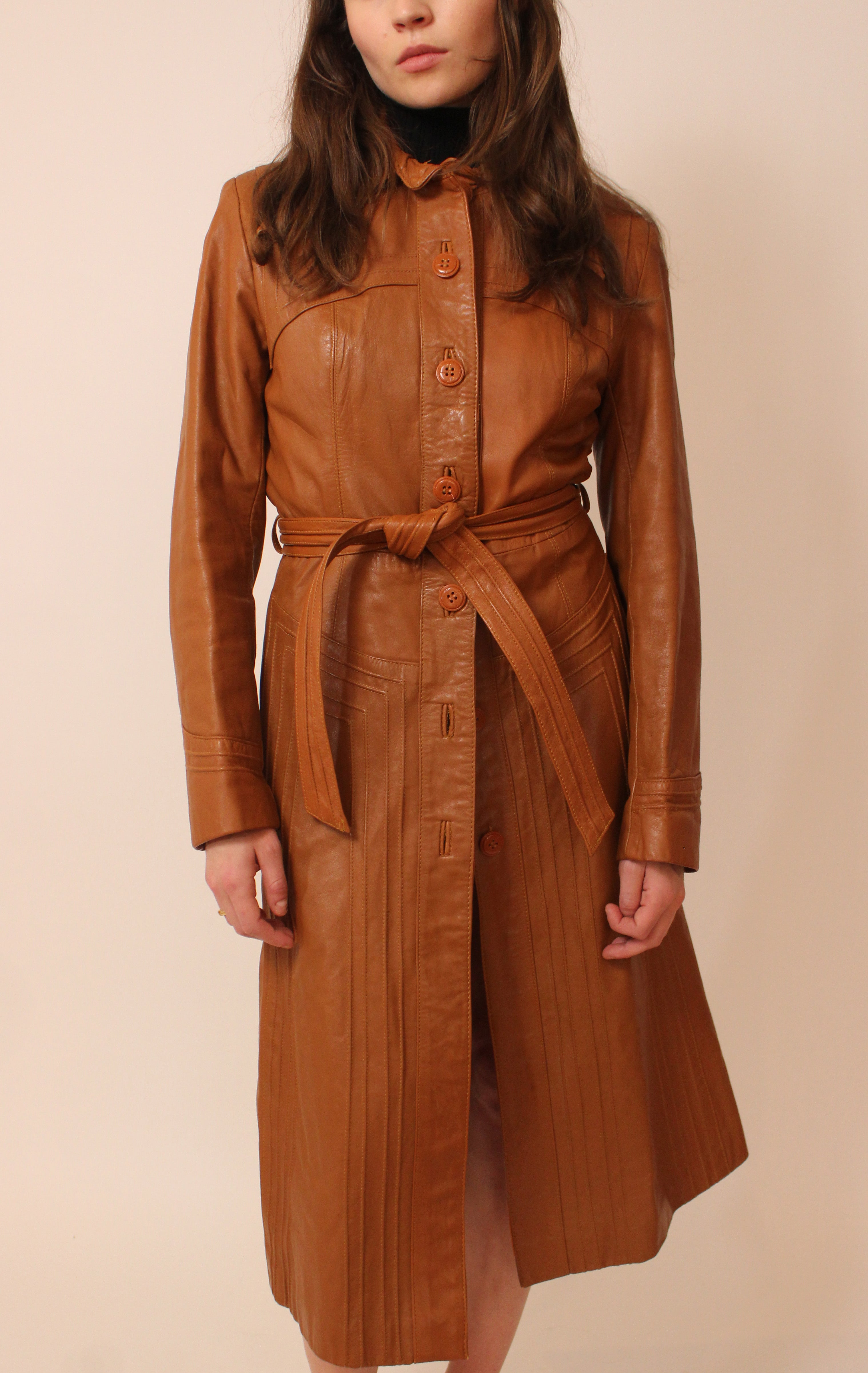 Rust orange belted leather trench coat