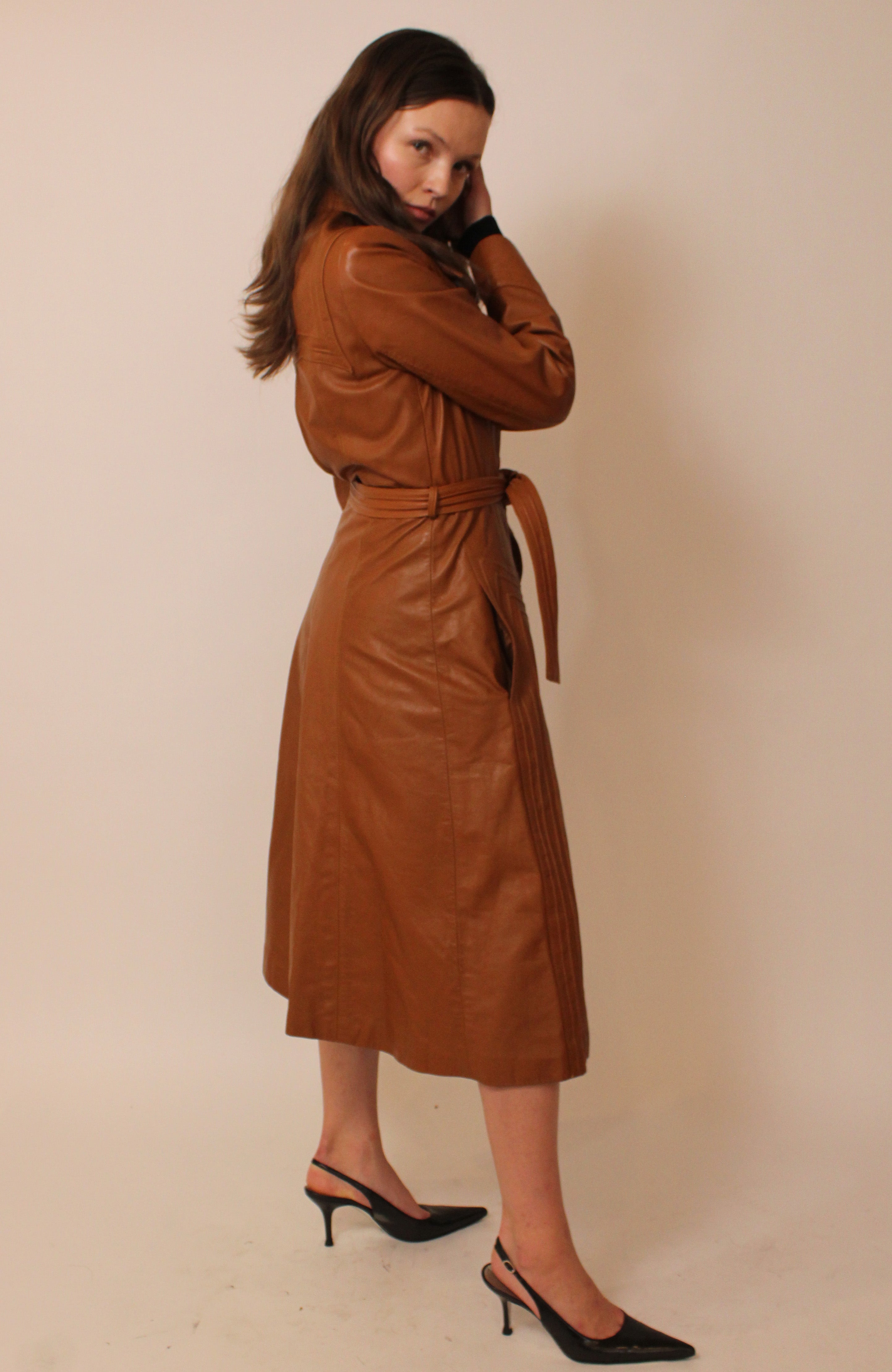 Rust orange belted leather trench coat