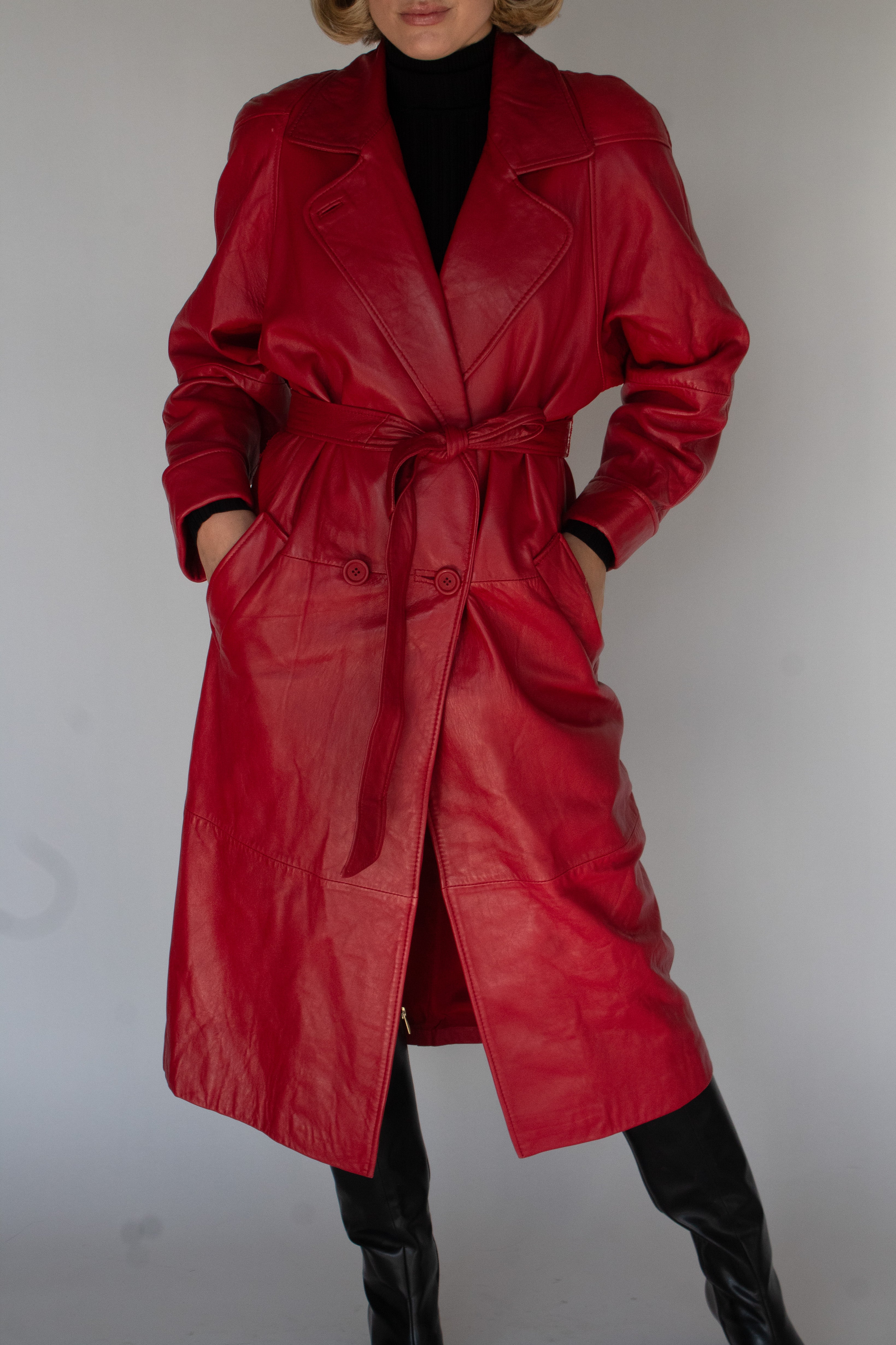 Cherry red belted leather trench coat