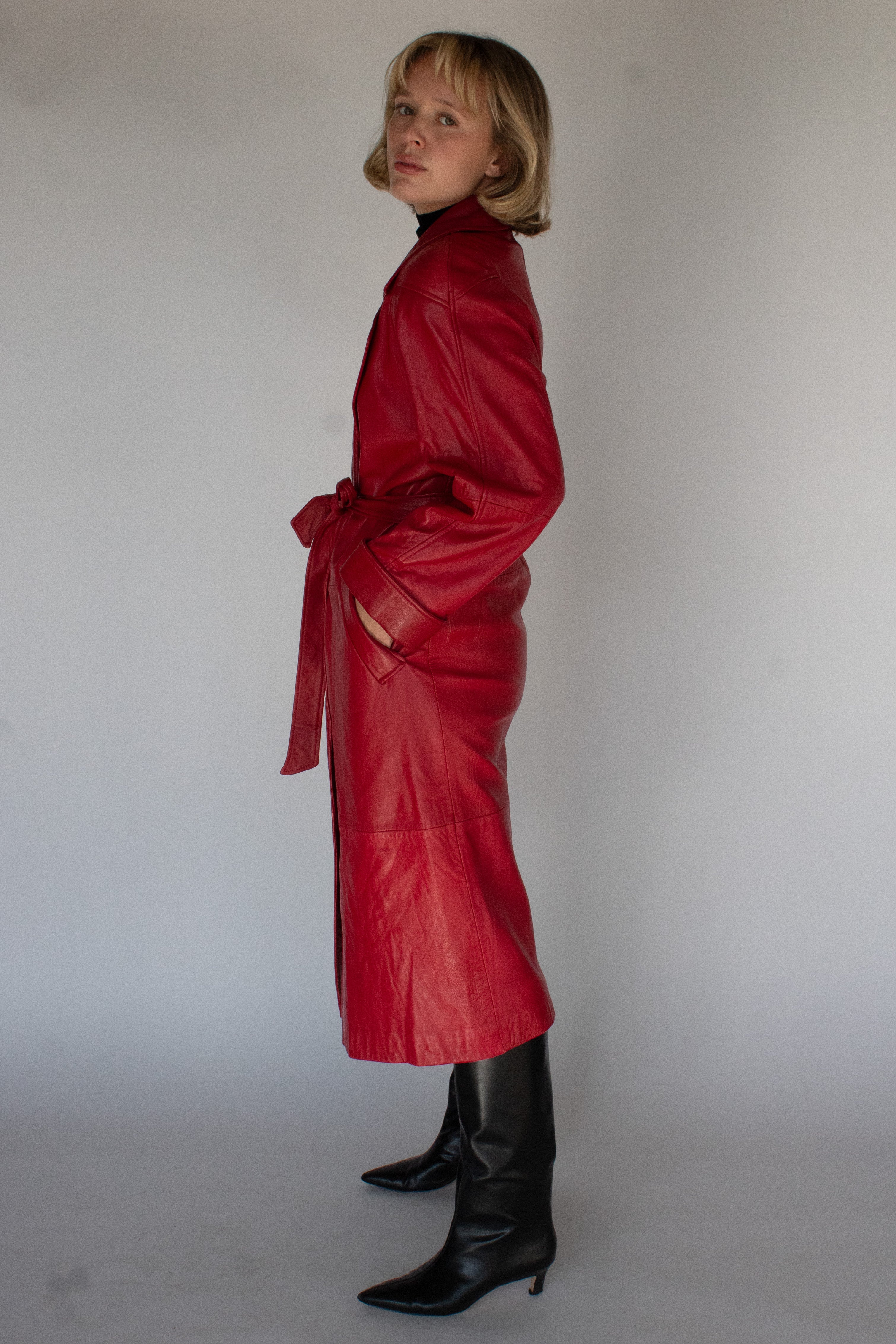 Cherry red belted leather trench coat