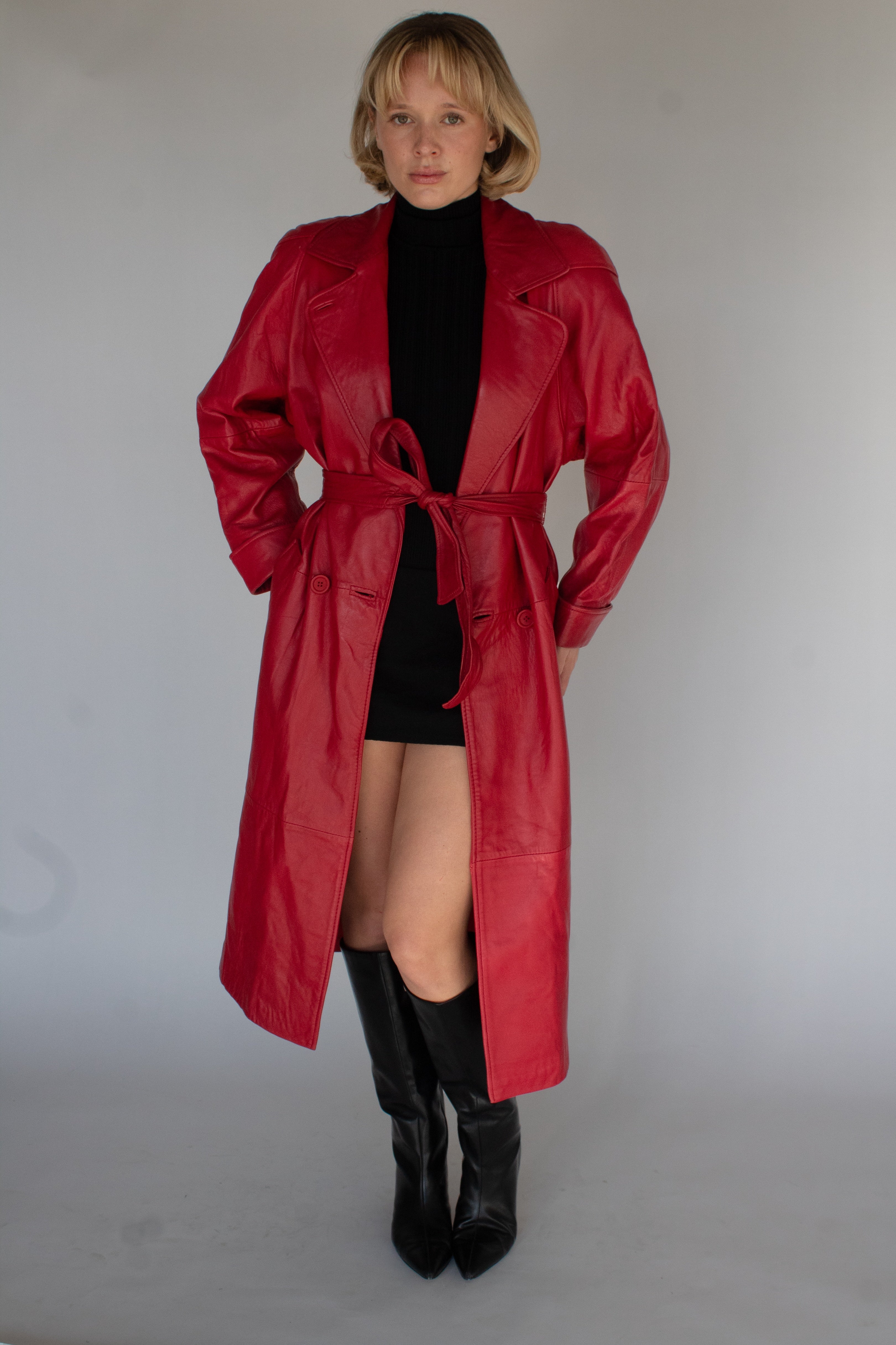 Cherry red belted leather trench coat