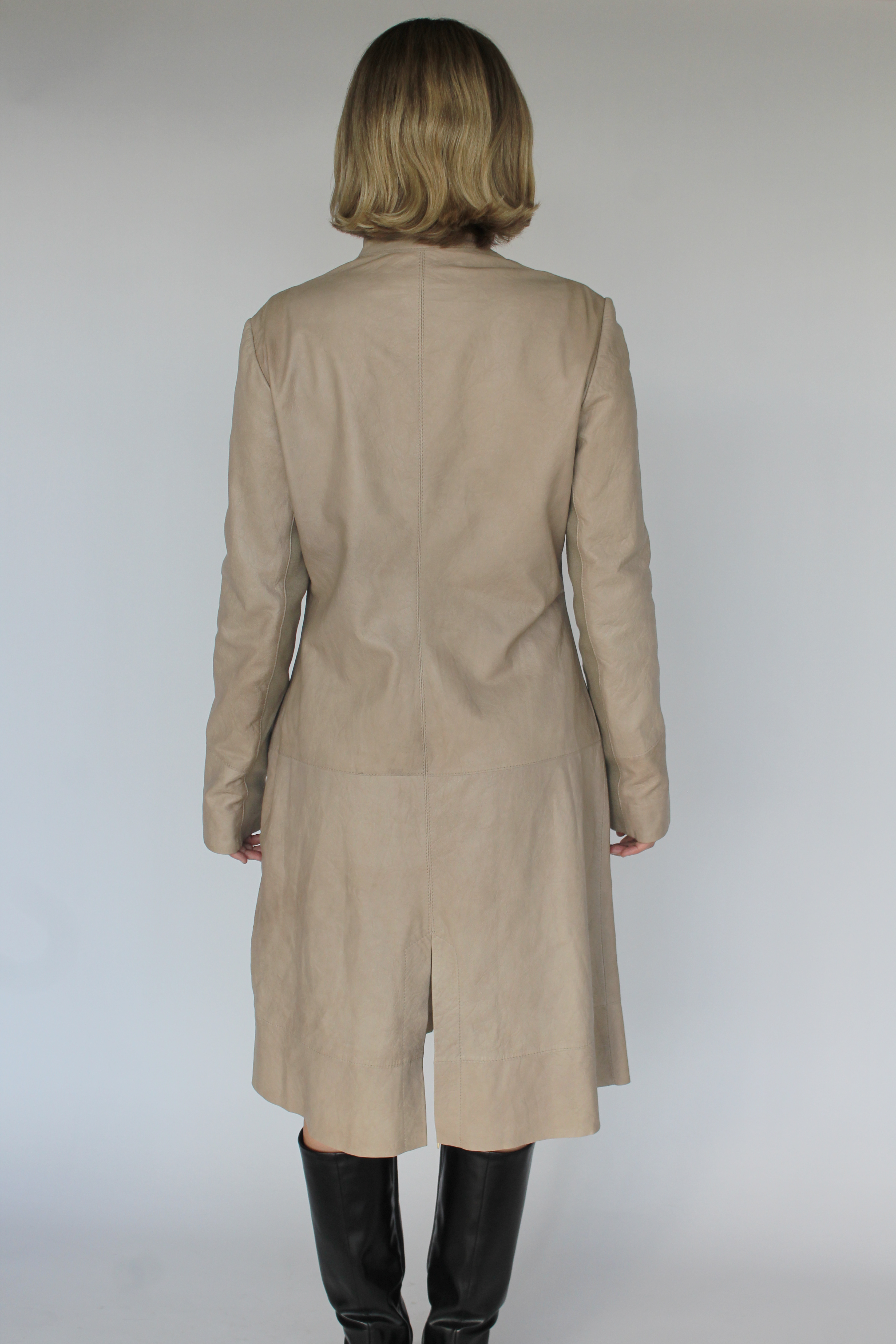 Cream asymmetrical leather coat